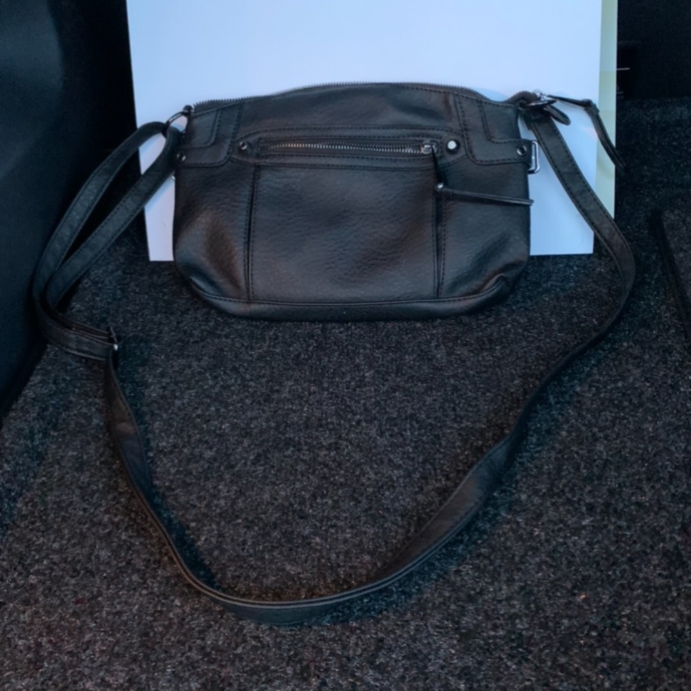 Very nice , clean Jessica Simpson black purse , soft and kept very clean